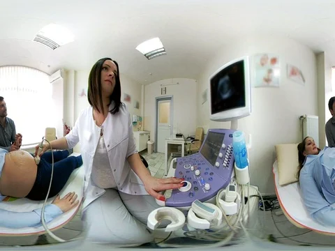 Vr 360 panorama Husband looking at ultrasound scan his pregnant woman Stock-Footage 74872947
