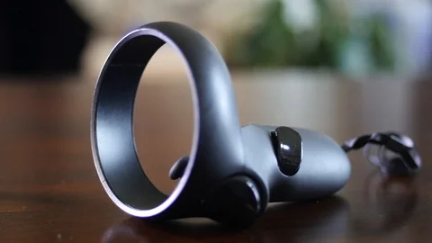 VR controllers sitting on a table Stock Footage 126870104