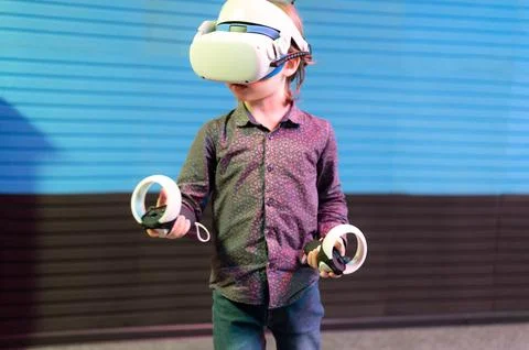 Vr game and virtual reality. kid boy gamer six years old fun playing on futur Stock Photos