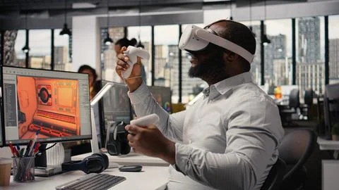 VR glasses cyberspace, game developer, video game in space, dual monitors Stock Photos