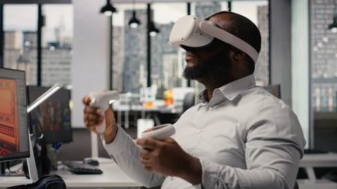 VR glasses cyberspace, game developer, video game in space, dual monitors Stock Photos