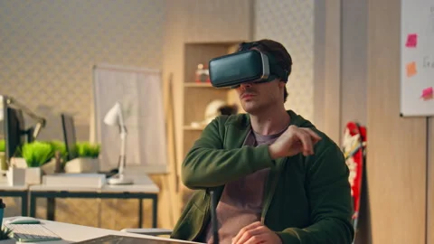 Vr glasses designer creating computer game closeup. Developer touching metaverse Stock Footage 246861634