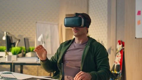 Vr glasses designer creating computer game closeup. Developer touching metaverse 写真素材