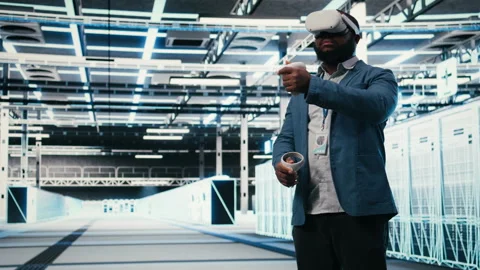 VR glasses equipment used by server hub employee to do maintenance Stock Footage 330378484
