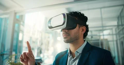 VR, headset and man in office with point, concept development or testing of.. Stock Photos