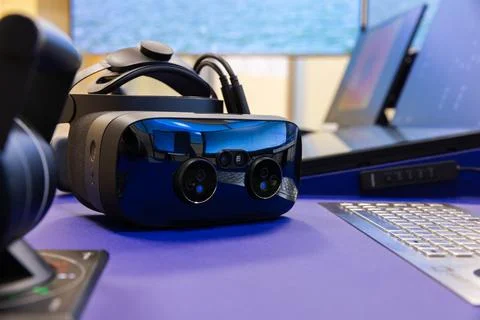 VR headset with cameras of with augmented reality lays on the desk, close up Stock Photos
