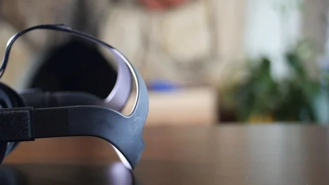 VR Headset sitting on a table Stock Footage 126870050