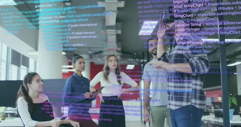VR presenter raising right hand in office generating code overlay guiding team Video stock 317800463