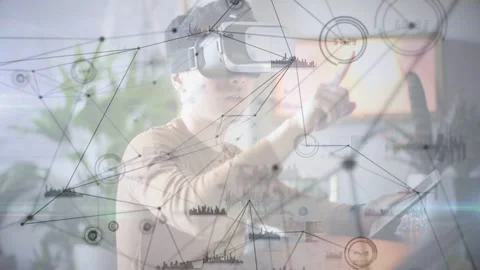 VR tester raising right hand and moving network HUD nodes in workspace, Stock Footage 332544812