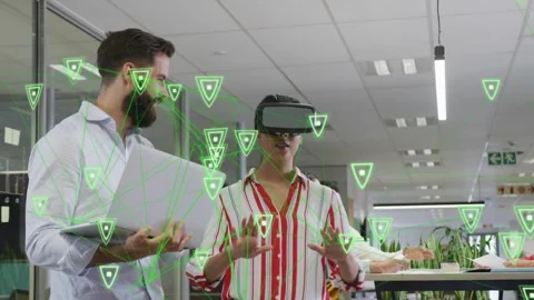VR user responding to AR node overlay, manipulating nodes while colleague Stock Footage 333278453