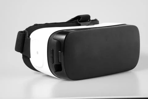 VR virtual reality glasses half turned isolated on white background Stock Photos