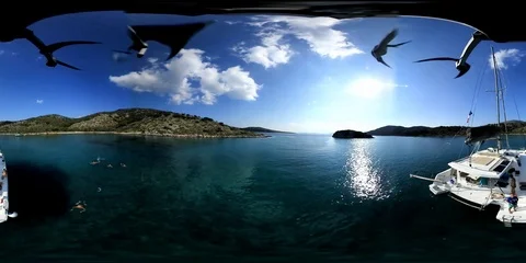 VR360 Aerial stunning view of lonely bay with some sailboat anchored Stock Footage 96698538