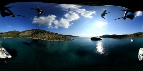VR360 Aerial stunning view of lonely bay with some sailboat anchored Stock Footage 96699088