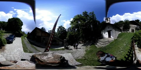 VR360 Alpine path with a chapel and trekkers walking Stock Footage 94562464