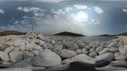 VR360 Breeze on a distant stone beach Stock Footage