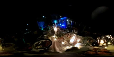 VR360. Candles on the festive table during the  open air party by night. Stock Footage 90285111