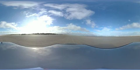 VR360, Car drives over sandy beach during storm on the North Sea, VR Stock Footage 117537839