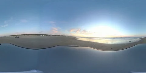 VR360, Car drives over sandy beach by sunset, North Sea, VR Stock Footage 117538570
