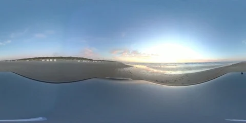 VR360, Car drives over sandy beach by sunset, North Sea, VR Stock Footage 117539091