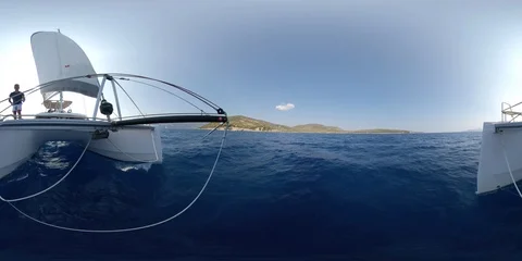 VR360 Catamaran sailing in a sunny summer day view from the bow  Stock Footage 120787353