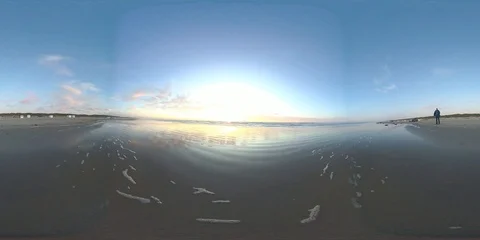 VR360, Couple on the beach by sunset, North Sea, VR Stock Footage 117715879
