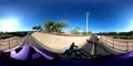 VR360 cycling via designated path circling city part 3 4k or 4k+ Resolution