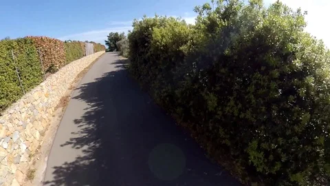VR360 effect a car runs along a panoramic road on the sea Stock Footage 107192308