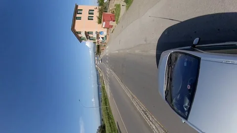 VR360 Effect  - A car runs in the evening on a bridge on a sea lagoon Stock Footage 107444627