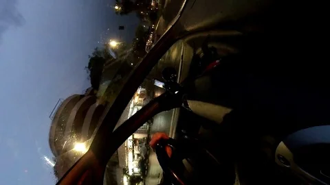 VR360 effect Hyperlapse A man drive a car in the city at night, vertical Stock Footage 107444879
