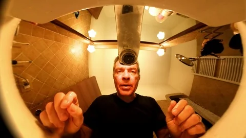 VR360 Effect A man in a bathroom washes his face on a sink Stock Footage 103205223