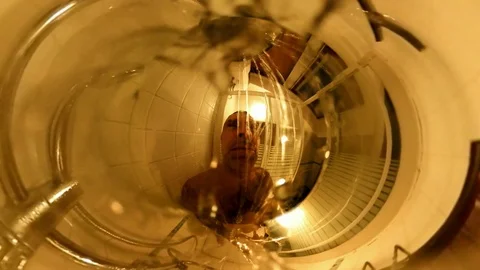 VR360 Effect, a man takes a shower, a close-up view under the water Stock Footage 103162150
