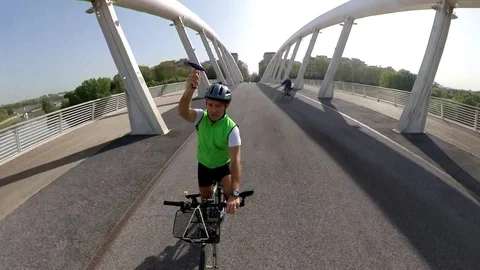 VR360 effect  Rome, a man rides a bike on the modern bridge of Music Stock Footage 107135518