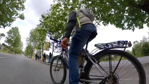 VR360 effect, Rome a man Rides a bike in a suburban area, cloudy day Stock Footage 107609407