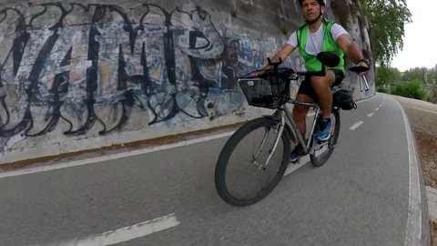 VR360 Extreme POV effect A biker rides on the bicycle lane Along the river Rome Stock Footage 107136044
