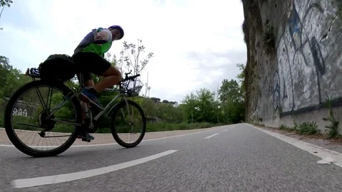 VR360 Extreme POV effect A biker rides on the bicycle lane Along the river Rome Stock Footage 107136101
