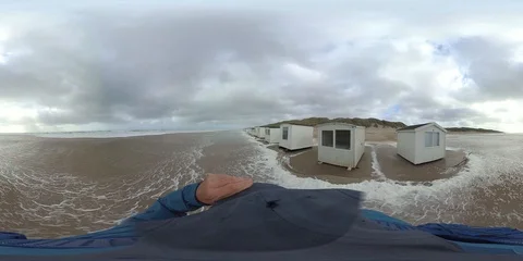 VR360, Man runs in storm on the beach, North Sea, algal foam, VR Stock Footage 117712267