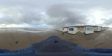 VR360, Man runs in storm on the beach, North Sea, algal foam, VR Stock Footage 117712518