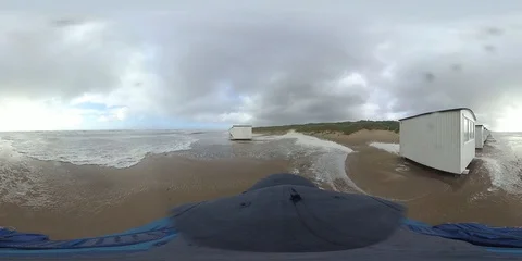 VR360, Man runs in storm on the beach, North Sea, algal foam, VR Stock Footage 117712600