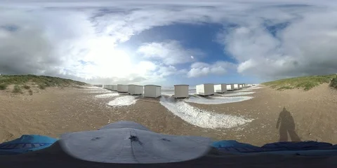 VR360, Man runs in storm on the beach, North Sea, algal foam, VR Stock Footage 117712677