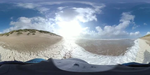 VR360, Man runs in storm on the beach, North Sea, algal foam, VR Stock Footage 117712947