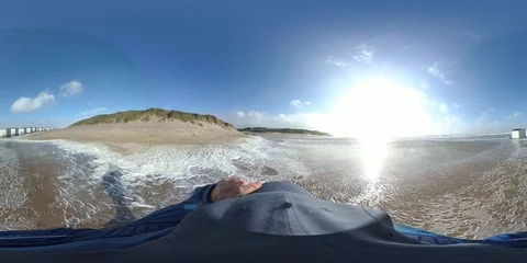 VR360, Man runs in storm on the beach, North Sea, algal foam, VR Stock Footage 117713005