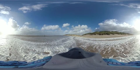 VR360, Man runs in storm on the beach, North Sea, algal foam, VR Stock Footage 117713412
