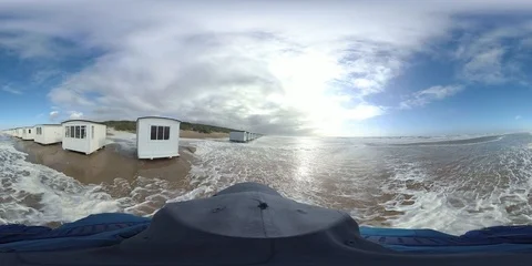 VR360, Man runs in storm on the beach, North Sea, algal foam, VR Stock Footage 117714205