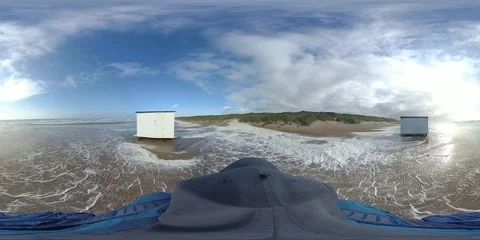 VR360, Man runs in storm on the beach, North Sea, algal foam, VR Stock Footage 117714357