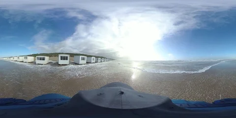 VR360, Man runs in storm on the beach, North Sea, algal foam, VR Stock Footage 117714502