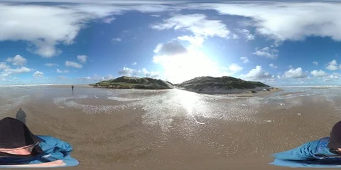 VR360, Man standing on the beach, storm on the North Sea, VR Stock Footage 117716916