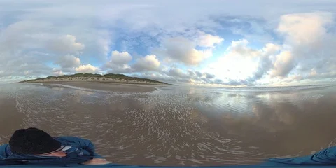 VR360, Man walks on the sandy beach of the North Sea at dusk, Denmark, VR Stock Footage 117708524