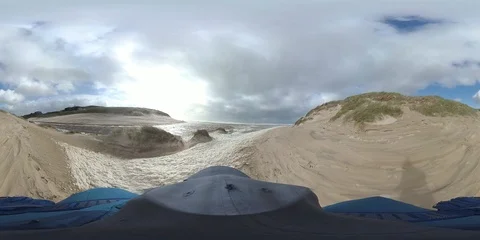 VR360, Man wanders on the beach through algae foam, stormy weather, VR Stock Footage 117713613
