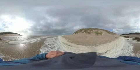 VR360, Man wanders on the beach through algae foam, stormy weather, VR Stock Footage 117713809
