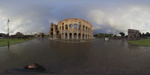 VR360 Rome, Arch of Constantine and Colosseum in rainy day at sunset Stock Footage 106576038